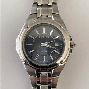 Seiko silver toned strap n bluish grey faced watch